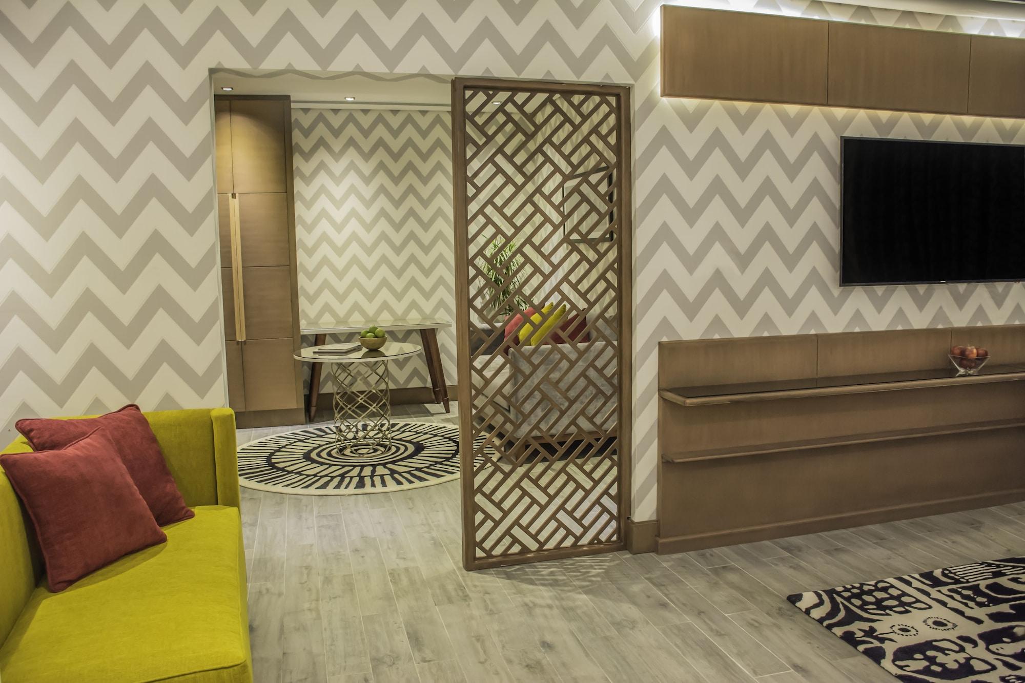 Radisson Blu Resort, Al Khobar 半月湾 外观 照片 A room divider in a living room